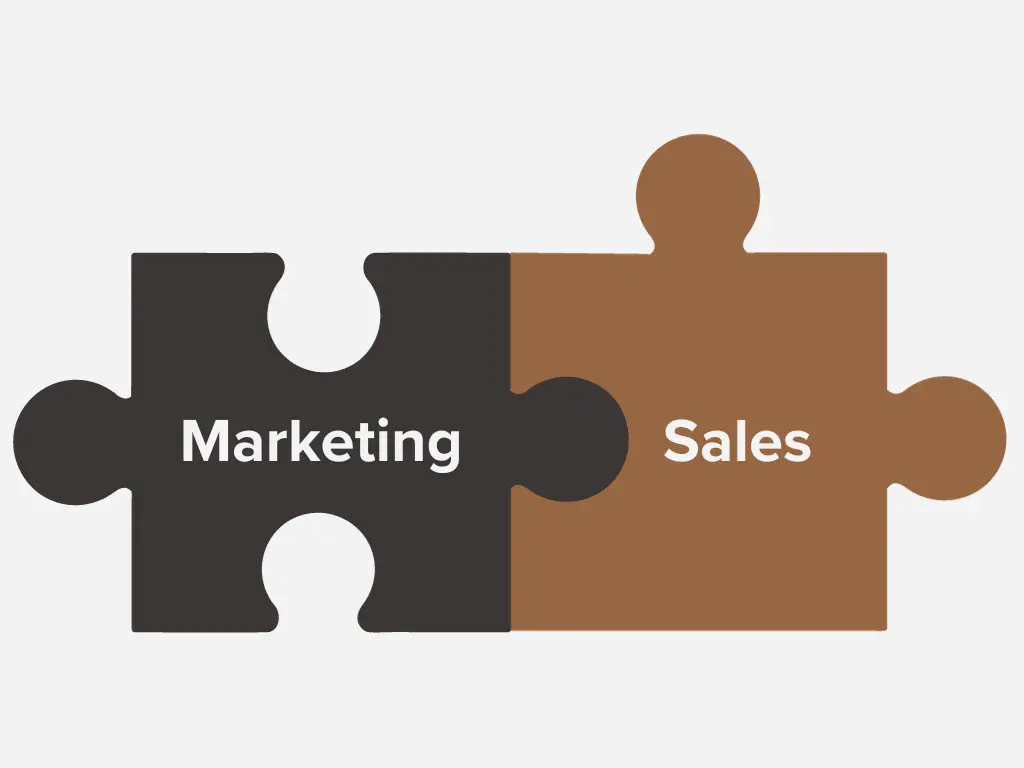 A puzzle piece with the words marketing and sales, unlocking the benefits of account-based marketing.